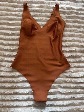 SKIMS unlined plunge thong bodysuit
